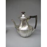 Victorian hallmarked Sterling silver lobed coffee pot with engraved decoration, ebonised handle