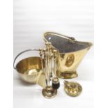 Brass coal scuttle, brass jam pan, brass candle holder and a brass companion set (4)