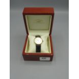 Rotary Gold Quartz Wristwatch with date signed two tone sunray dial with applied baton hour