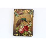 C19th black papier mache card case, painted in a gilt wash background with birds of paradise on