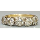 18ct yellow gold five stone diamond ring, set with five brilliant cut diamonds, in claw settings, on