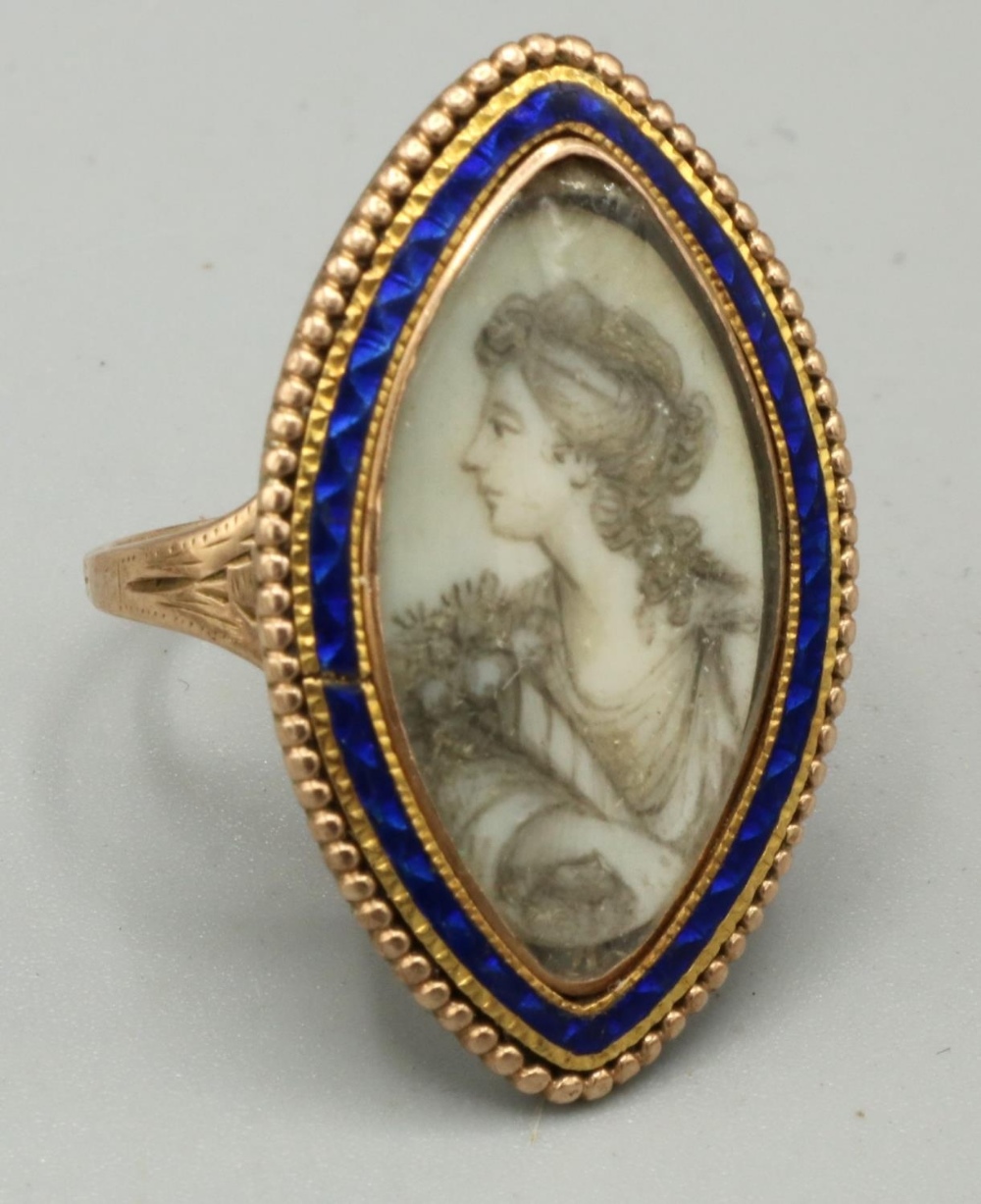 Georgian gold coloured metal navette shaped mourning ring, painted with a half length portrait of