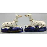 Pair of Staffordshire Dalmatian pen holders, on gilt lined blue bases, L12cm H9cm (2)