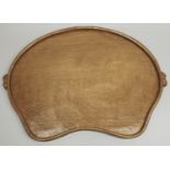 Robert Mouseman Thompson of Kilburn - an adzed oak kidney shaped galleried tray, carved with two