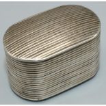 George III hallmarked silver rounded rectangular nutmeg grater, all over reeded with hinged cover