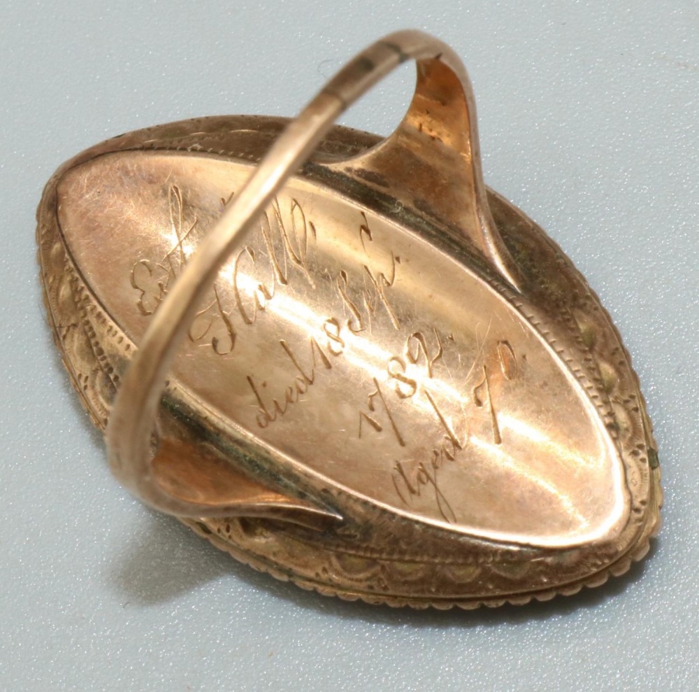 Georgian gold coloured metal navette shaped mourning ring, painted with a half length portrait of - Image 2 of 2