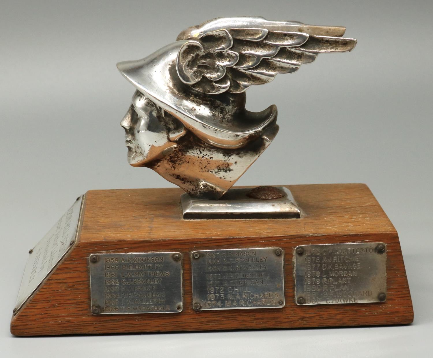 C20th chromed cast metal head of Hermes, mounted on an oak plinth as a trophy for 'Marton Hall - Image 3 of 3