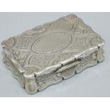 Victorian hallmarked silver shaped oval vinaigrette, hinged cover with a scroll cartouche on a