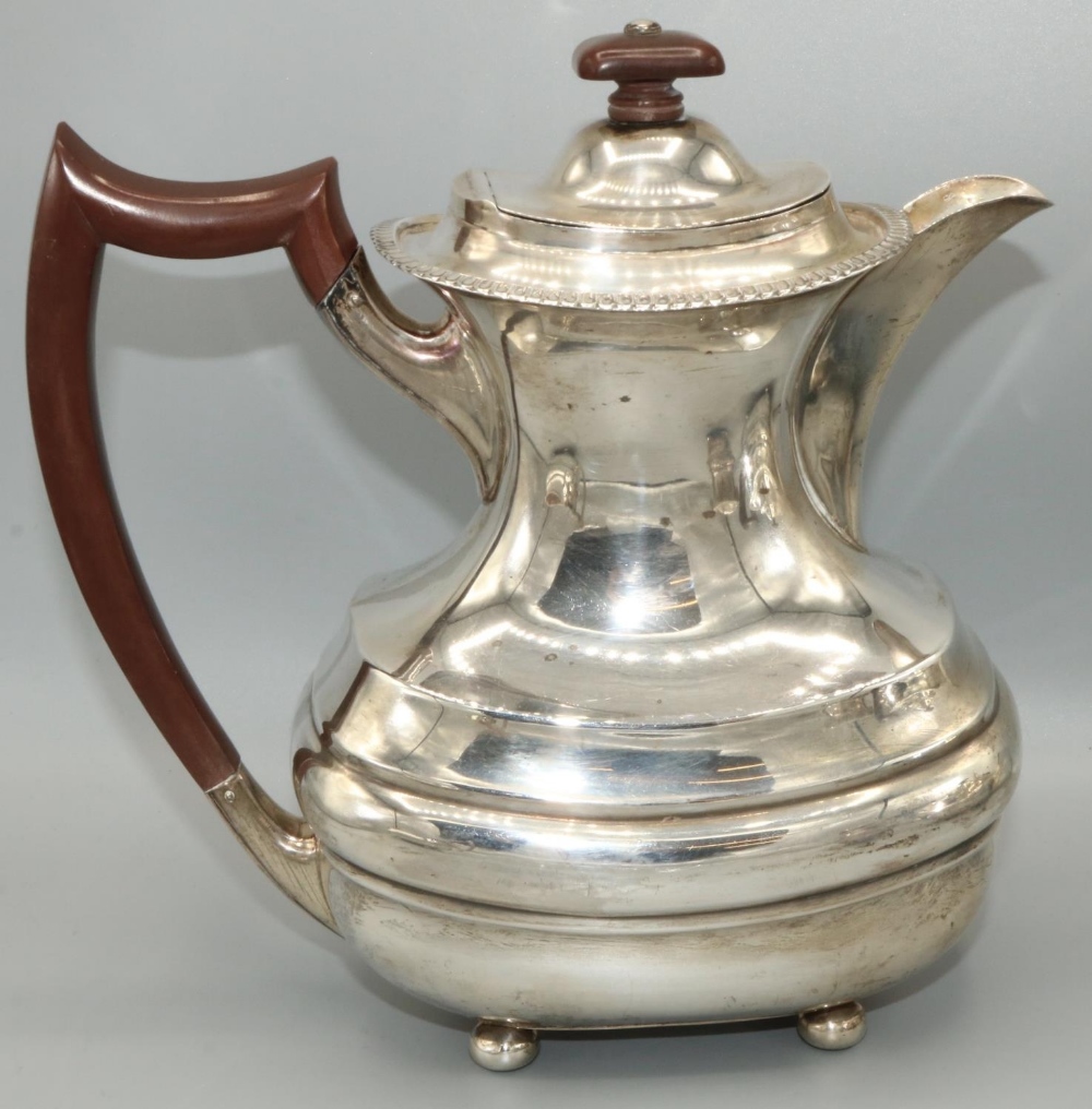 George.VI hallmarked silver four piece tea service, ovoid bodies with gadrooned rims on ball feet, - Image 2 of 5