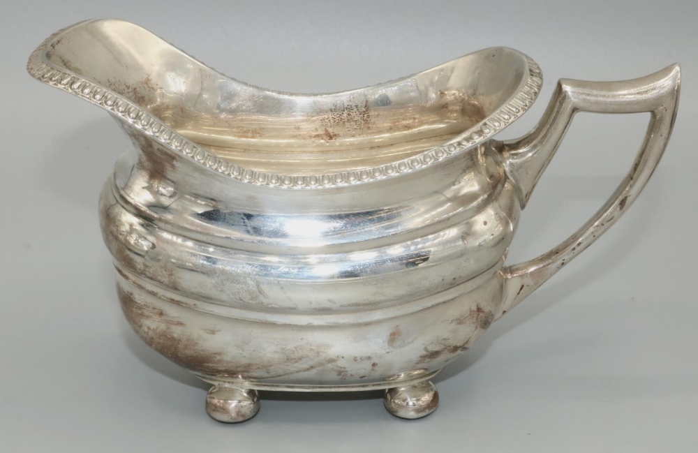 George.VI hallmarked silver four piece tea service, ovoid bodies with gadrooned rims on ball feet, - Image 5 of 5