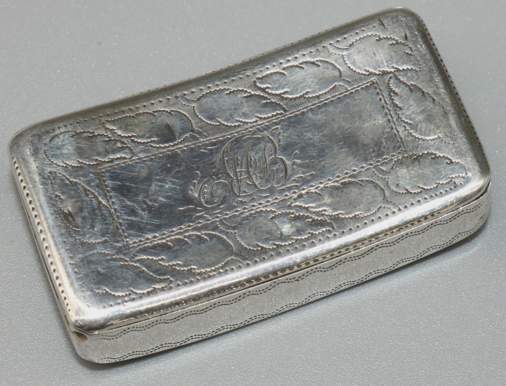 George III hallmarked silver rectangular snuff box, of curved form, decorated with wrigglework and