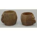 Robert Mouseman Thompson of Kilburn - two octagonal oak napkin rings, both carved with signature