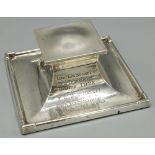 George V hallmarked silver square inkwell, with hinged lid, engraved 'Leeds Law Society Golf