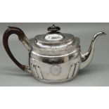 George III hallmarked silver teapot, part lobed body with engraved bands, initialed cartouche,