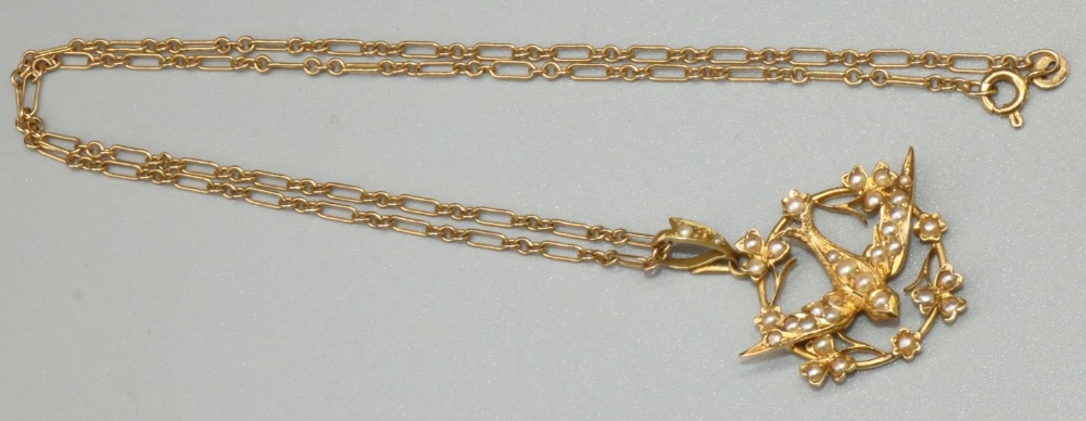 18ct yellow gold Edwardian swallow pendant set with seed pearls, stamped 18k with worn hallmarks, on - Image 2 of 3