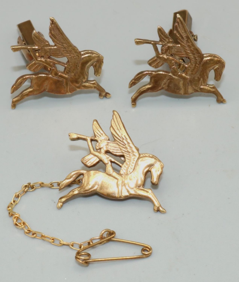 Pair of gold Pegasus and Bellerophon cuff links and matching tie pin, commissioned by a former