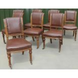 Set of eight Victorian golden oak dining chairs, with scrolled backs and serpentine seats on