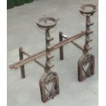 Pair of cast iron fire dogs, fire basket tops on curved openwork scrolled supports, H76cm (2)