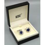 Pair of Montblanc chrome circular cufflinks, with blue inset in Montblanc surround, stamped