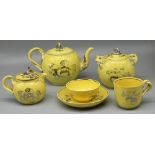 Leeds Pottery tea service, decorated in silver lustre with fruit and foliage on a yellow ground,