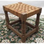 Sid Pollard of Thirsk - oak rectangular stool, plaited leather top on octagonal baluster supports,