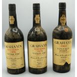 Two bottles of Graham's Malvedos 1976 Vintage Port and Grahams 1963 Vintage Port, 3btls