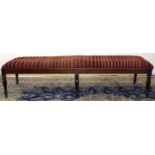 Large Victorian and later rectangular window seat, loose seat covered in striped kelim, on six