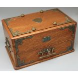 Edwardian brass bound oak smokers cabinet, hinged lid with cedar liner interior above a fitted