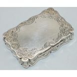 Victorian hallmarked silver shaped rectangular snuff box, all over engraved with scrolls and