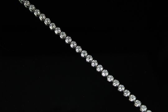 18ct white gold diamond bracelet set with 38 brilliant cut diamonds, with box closure, stamped - Image 3 of 3