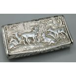 George V hallmarked silver rectangular snuff box with curved bas, all over repousse with hunting