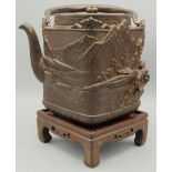 Japanese Meiji period cast iron Tetsubin or kettle, square body decorated in high relief with