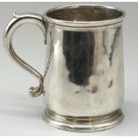 George III hallmarked silver mug, plain tapering body with S scroll handle, on stepped circular