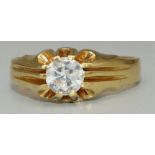 18ct yellow gold solitaire ring, the round cut diamond in claw setting, on grooved shoulders and