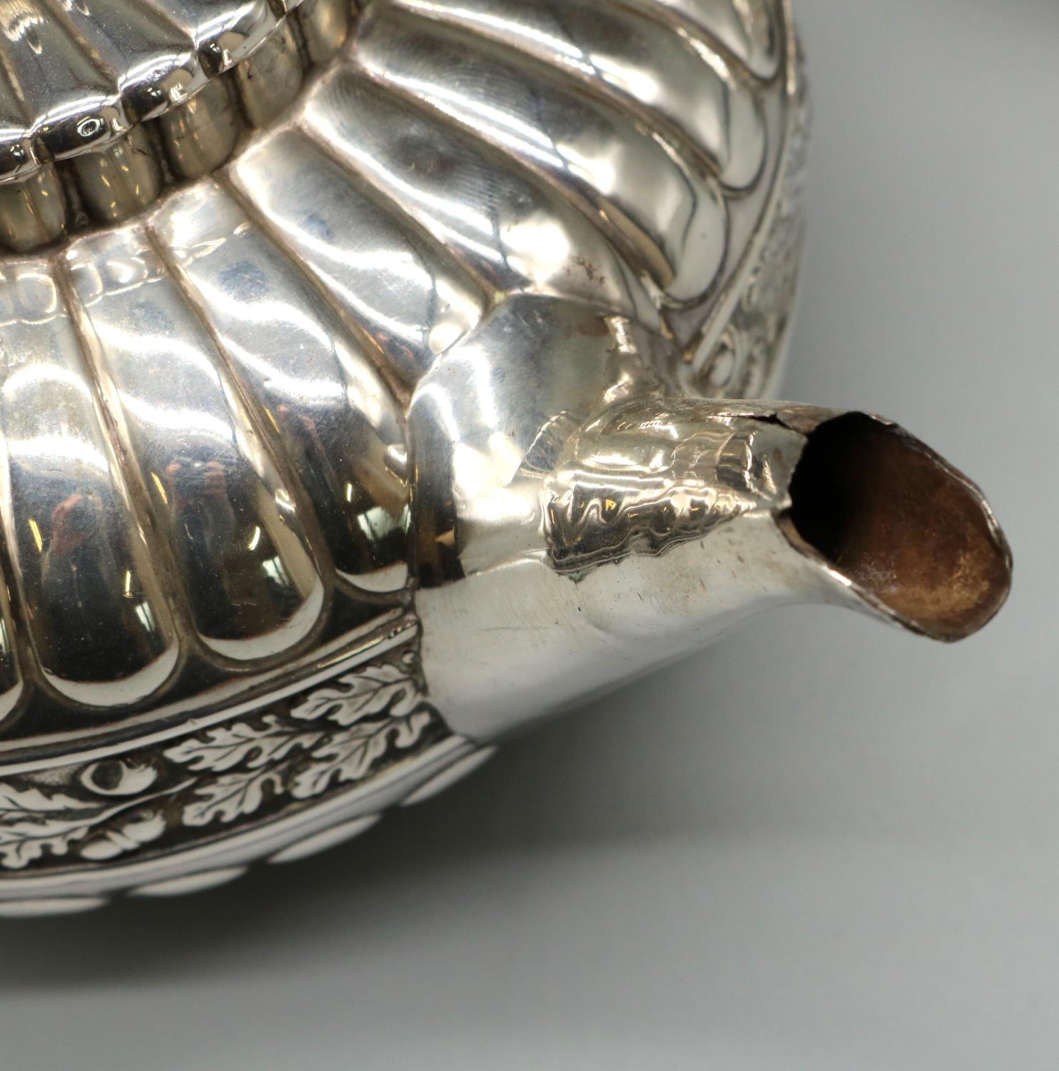George IV hallmarked silver three piece tea service, compressed lobed circular bodies with an oak - Image 6 of 6