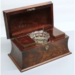 Victorian sarcophagus shaped mahogany curl veneer tea caddy, with two lidded canisters and glass