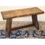 C20th rustic elm side table, rectangular top on outsplayed solid end supports joined by a pegged