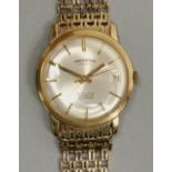 Winegartens of London, gold cased automatic wristwatch with date, signed silvered dial with