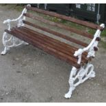 Coalbrookdale cast metal garden bench, ends depicting serpent, leaves and dogs head, wooden slats,
