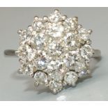 18ct white gold diamond cluster ring, the nineteen brilliant cut diamonds in claw settings, on