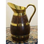 Large early C20th coopered oak jug, with brass bands, handle and spout, H58cm
