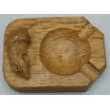 Robert Mouseman Thompson of Kilburn - an oak canted rectangular ashtray, carved with signature