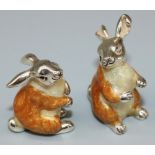 Dom Joly Collection - Pair of Continental silver and enamel models of seated Rabbits, marked JAH