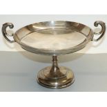 George V hallmarked silver circular pedestal fruit bowl, with two scroll handles, by Walker and Hall