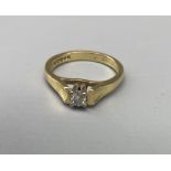18ct yellow gold diamond solitaire ring, set with brilliant cut diamond, stamped 18, size M1/2, 4.4g