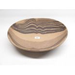 Large studio pottery unglazed fruit bowl with striated stripe pattern, W41cm