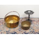 Two brass jam pans and a small cast iron stand, H27cm