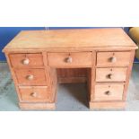 Jenny Powell Collection - Pine kneehole dressing table, moulded top and seven drawers with turned