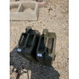 Pair of military jerry cans dated 1969 and 1975 one with broad arrow (2)