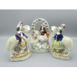 Three Staffordshire figures with sheep, H19.5cm